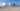 Large industrial building with a clear blue sky